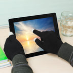 Knit touchscreen gloves tapping a tablet screen