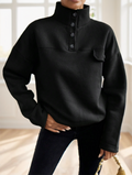Black oversized snap collar pullover sweatshirt with jeans, front view