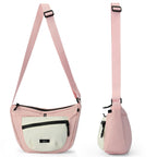 Nylon crescent crossbody bag in pink with a cream front pocket, front and side view