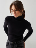 Fitted rib-knit turtleneck in black