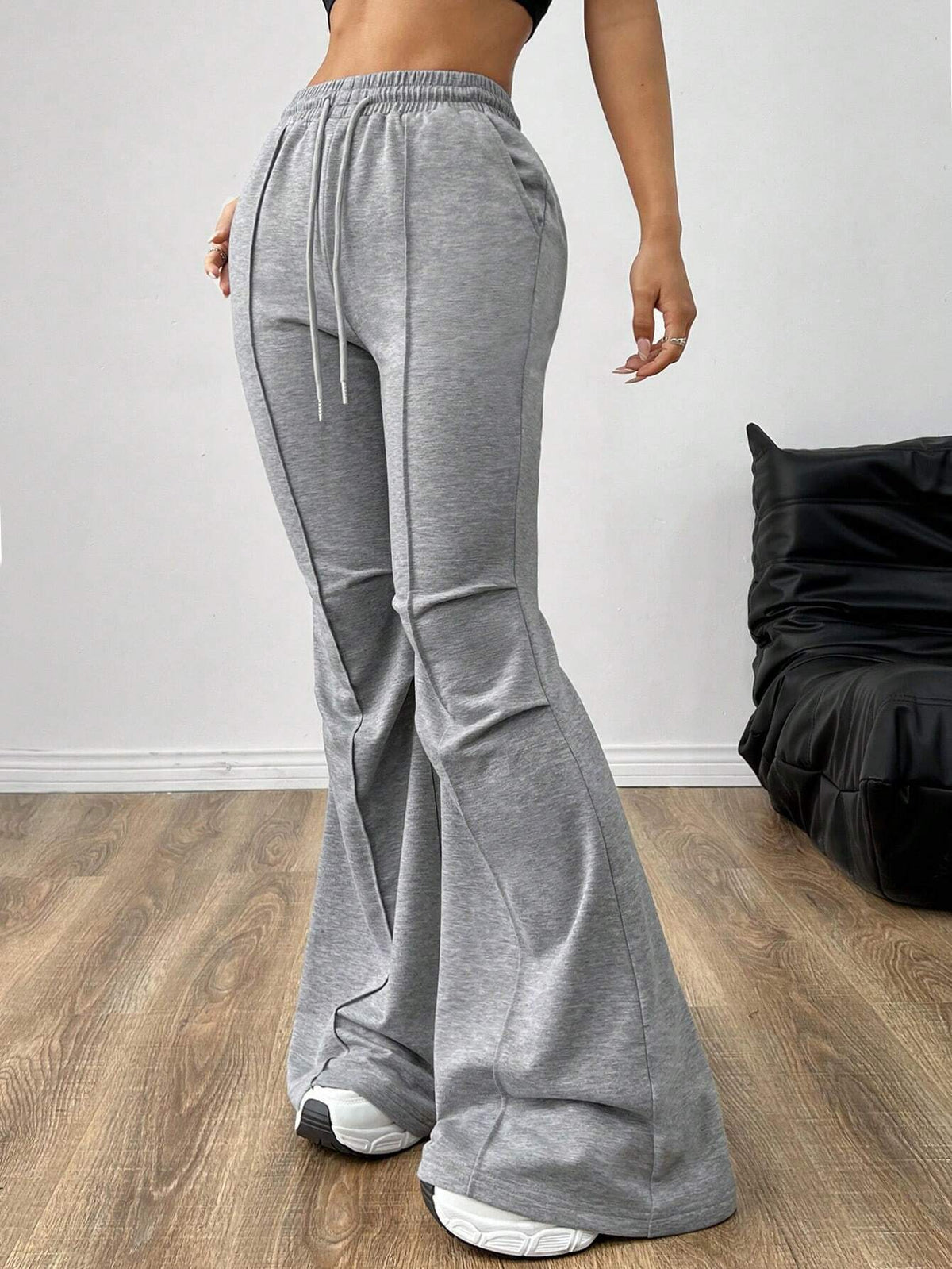 Side view of the gray flare sweatpants