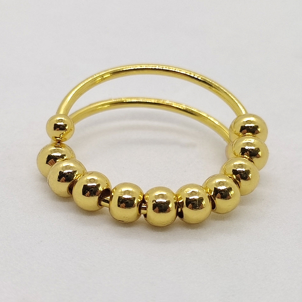 Gold tone beaded wrap ring close up