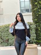 Color block knit pullover, side view