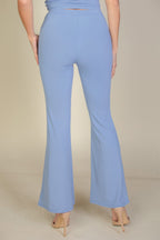 Cloud blue high waisted flare pants, back view