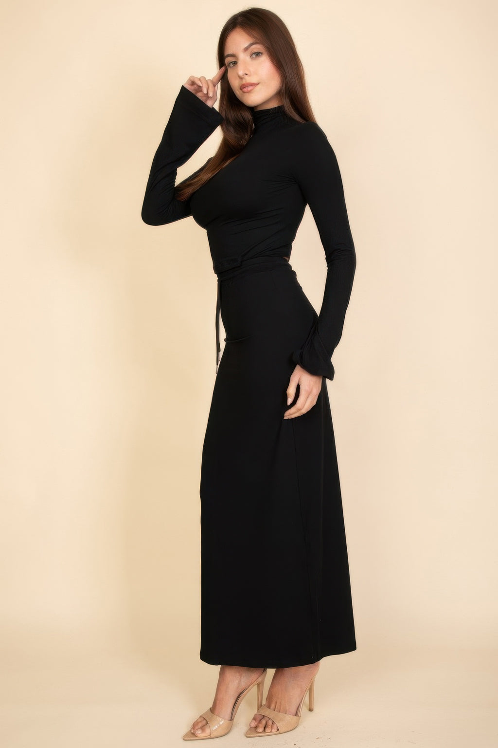 Black bell sleeve crop top and maxi skirt set, posed side view
