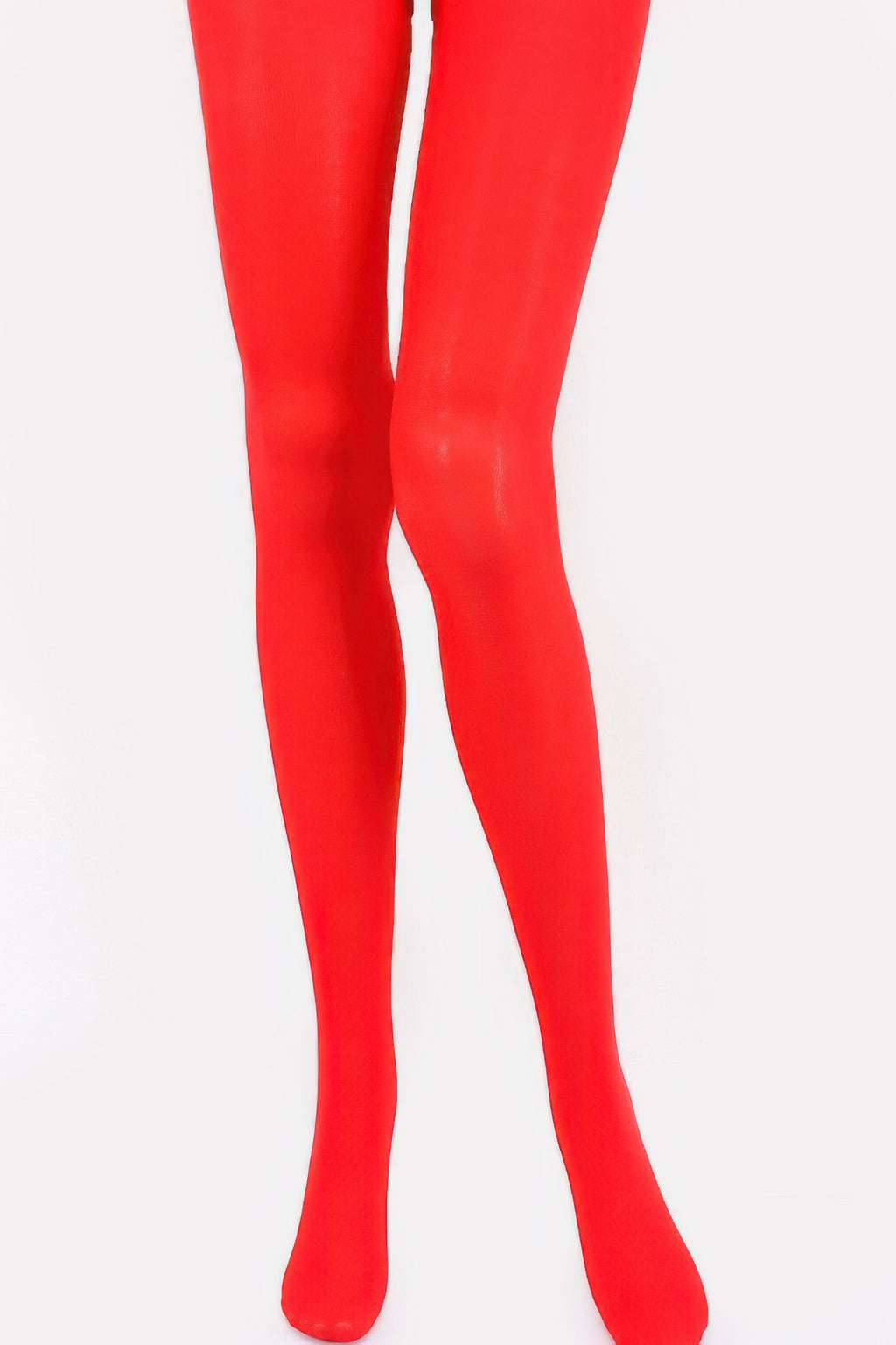 Colored sheer tights in red, worn with a full foot