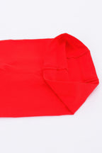 Close up of the red sheer tights fabric