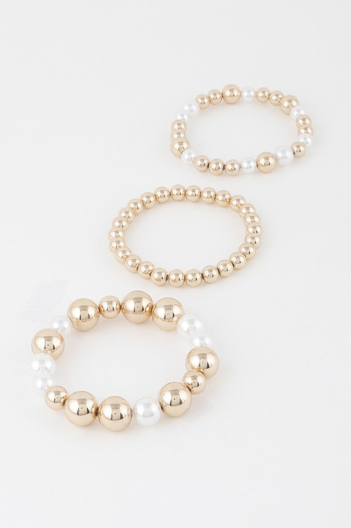 Triple Pearl Bead Stretch Bracelet in Gold cream, photo 4