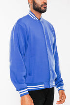Black and grey fleece varsity jacket, front view