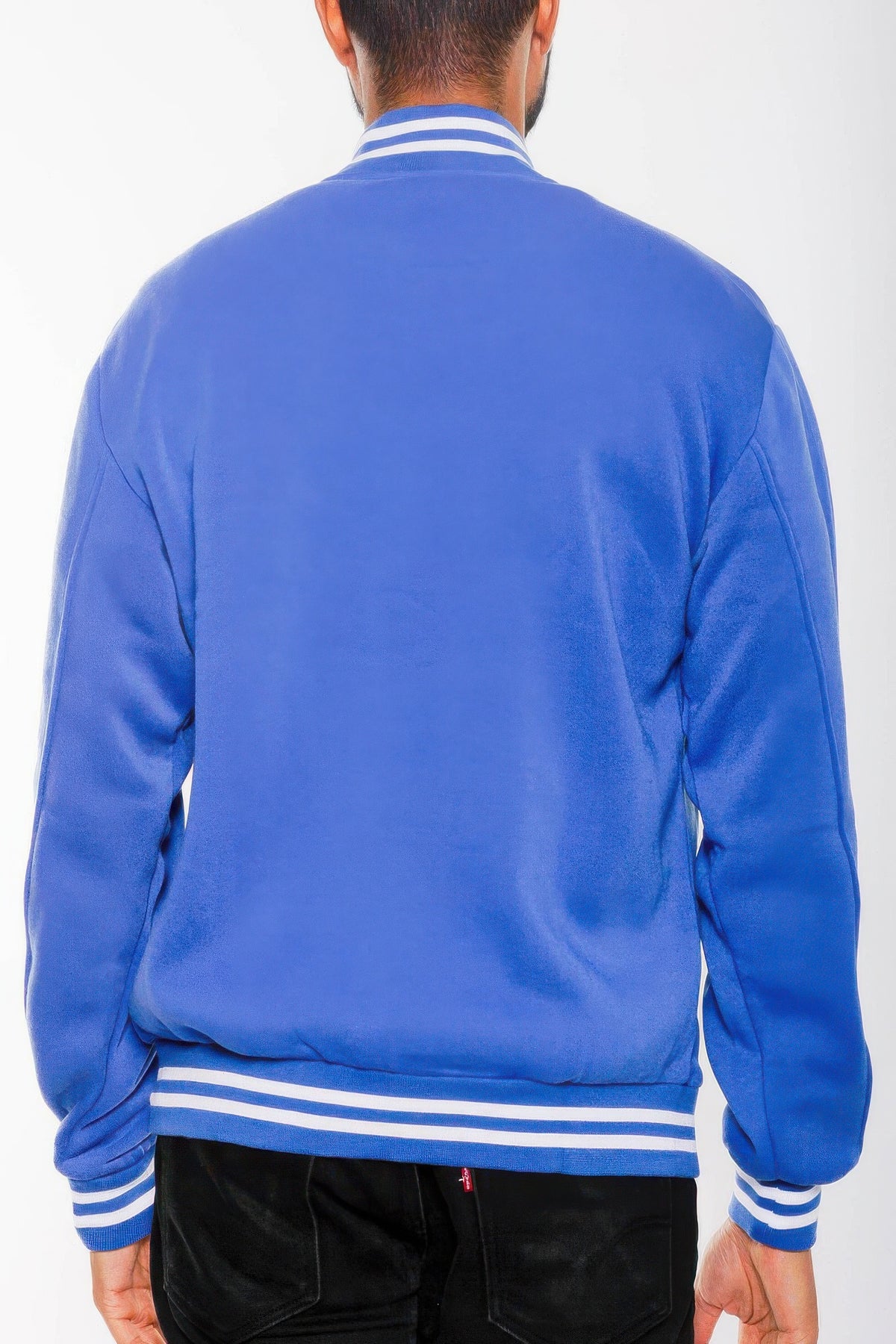 Royal blue fleece varsity jacket, side view