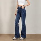 Dark indigo high waist flare jeans, three-quarter view