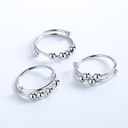 Set of silver tone beaded rings